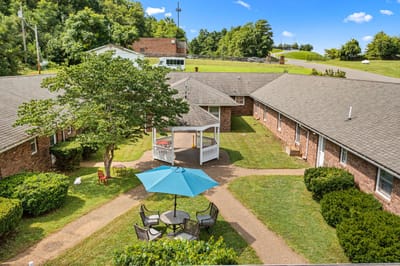 Outdoor area with seating and a gazebo
