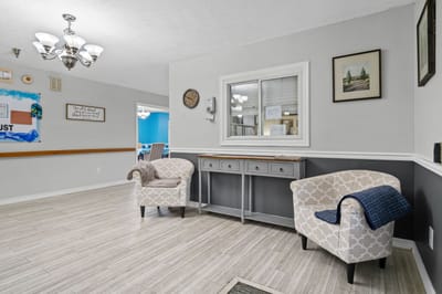 Interior view of a common area with chairs and decor