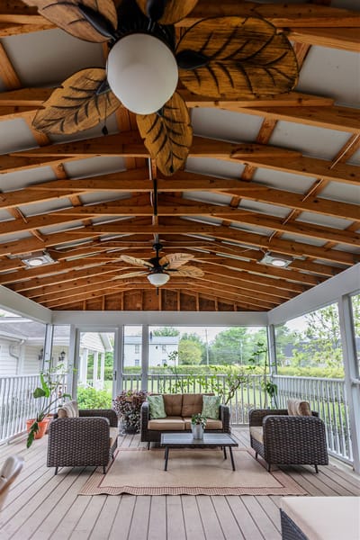 Babcock Manor, Inc., assisted living in Appomattox, VA — Covered patio with wicker seating and ceiling fans