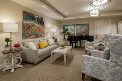 Cozy interior common area with seating and artwork