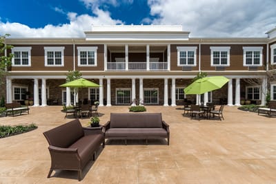 Outdoor courtyard with seating and greenery