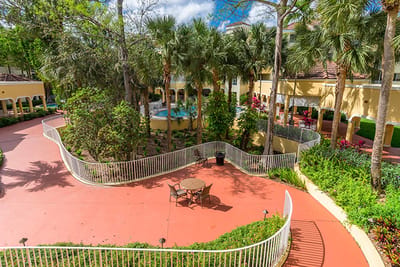 Aerial view of landscaped outdoor space with seating