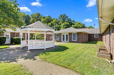 Outdoor courtyard with gazebo and garden