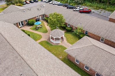 Aerial view of a courtyard with gazebo and surrounding buildings