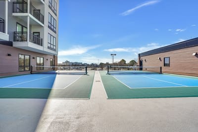 Outdoor sports courts with a clear blue sky