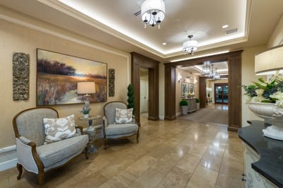 Bright and welcoming lobby area with seating and artwork