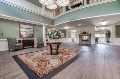 Bright interior common area with seating and decor