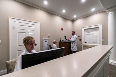 Staff working at the reception area in a nursing home