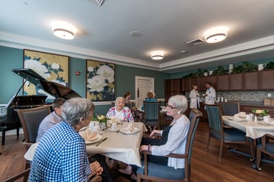 Residents engaging in conversation in a common area