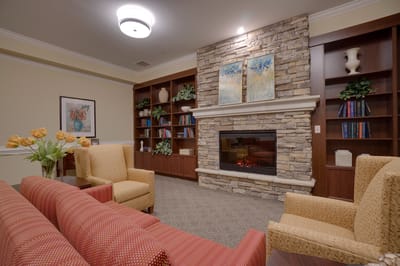 Cozy common area with seating and a fireplace