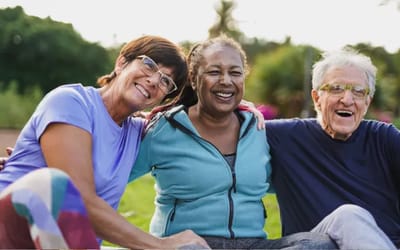 Three seniors enjoying a sunny day outdoors