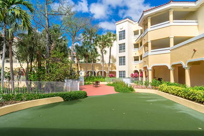 Outdoor courtyard with seating and greenery