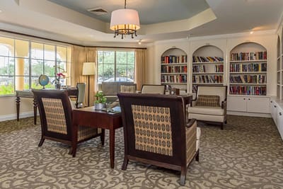 Cozy common area with bookshelves and seating