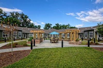 Outdoor courtyard with seating and landscaping