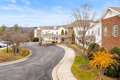 Exterior view of TerraBella Salem with drive and landscaping