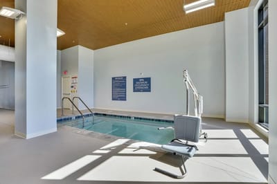 Interior view of a therapeutic spa with a pool