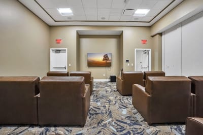 Interior common area with seating and television