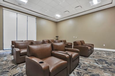 Interior seating area with brown chairs