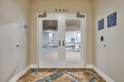 Entrance to the pool area with double doors