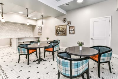 Bright social space with tables and chairs