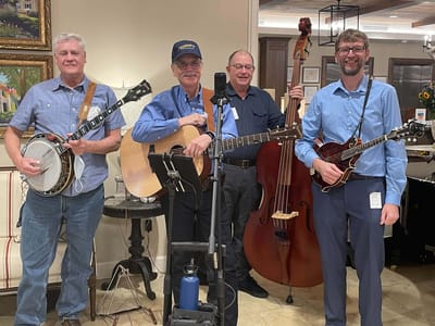 Musicians performing at an activity in the facility