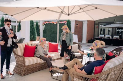 Residents socializing in an outdoor lounge area