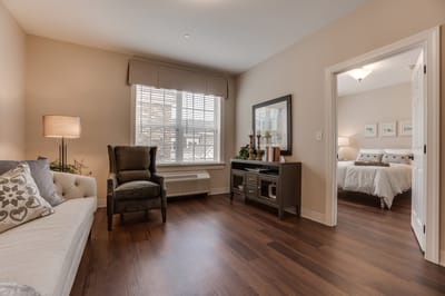 Bright interior room with a cozy armchair and décor