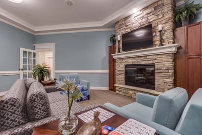 Cozy common area with seating and fireplace