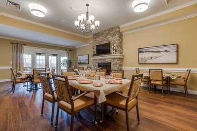 Dining room setup with tables and chairs