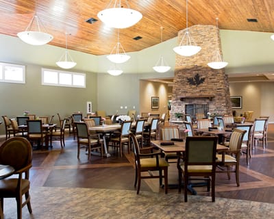 Bright dining room with tables and chairs