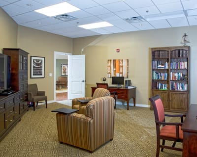 Interior room with seating and bookshelves