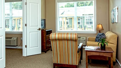 Cozy interior of a resident's room with comfortable furniture