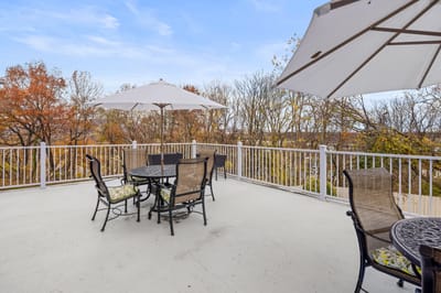 Outdoor patio area with seating and umbrellas