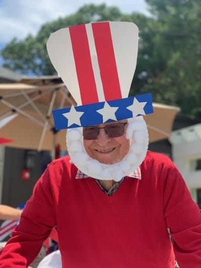 Resident dressed in festive costume during celebration