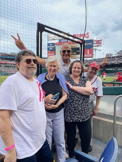 Residents enjoying a baseball game outdoors