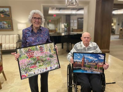 Residents showcasing their artwork in a common area