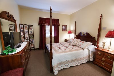 Private resident room with a bed and decorations
