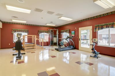 Well-equipped fitness area in a senior living facility