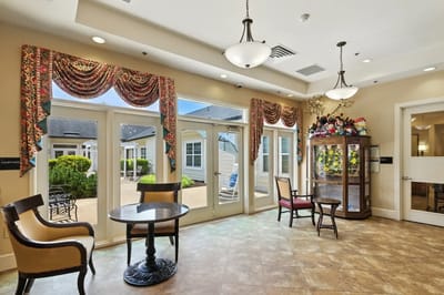 Bright common area with seating and windows
