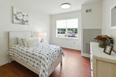 Cozy private resident room with floral decor