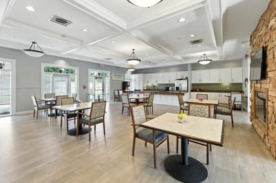 Bright dining room with tables and chairs