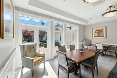 Interior common area with dining table and chairs