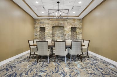Interior meeting room with a large wooden table