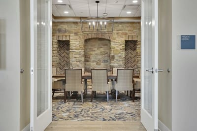 Private dining area with stylish decor and table settings