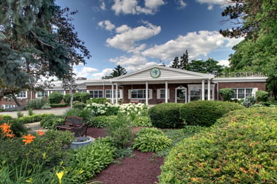 Exterior view of BRIA of Geneva with gardens