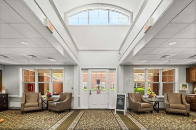 Bright common area with seating and windows