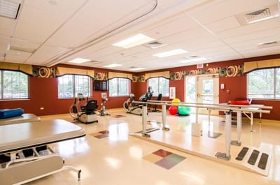 Rehabilitation room with exercise equipment for residents