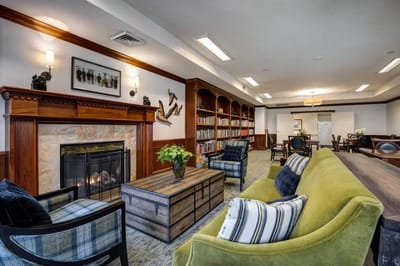 Interior view of a cozy common area with a fireplace