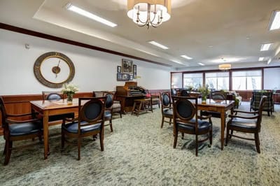 Interior view of a common area with tables and chairs