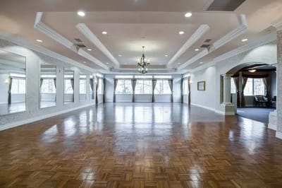 Bright and spacious interior common area with wooden flooring
